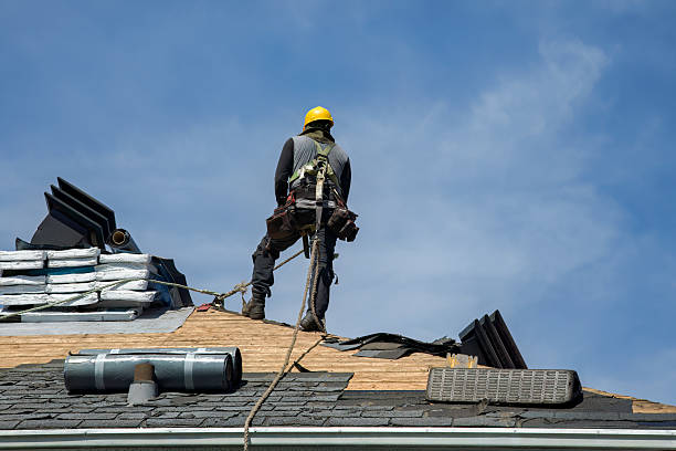 Professional Roof Replacement technician working in Milan, OH
